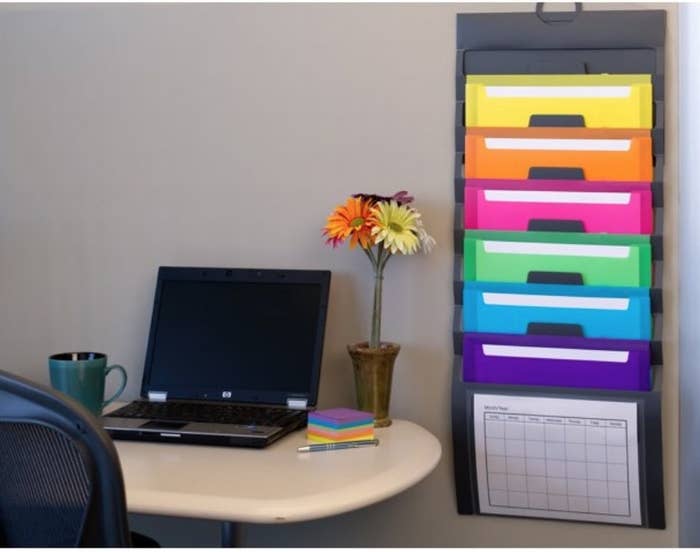 A multi-colored, wall-hanging set of folders