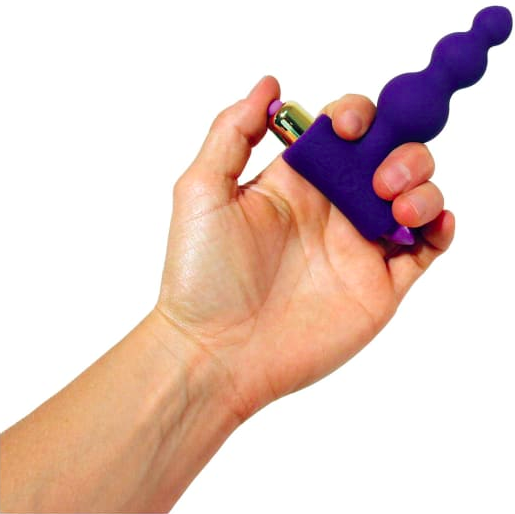 Model holds purple battery-operated anal beads in their hand