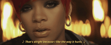 A GIF of Rihanna saying &quot;That&#x27;s alright because I like the way it hurts&quot; from the &quot;Love the Way You Lie&quot; music video.