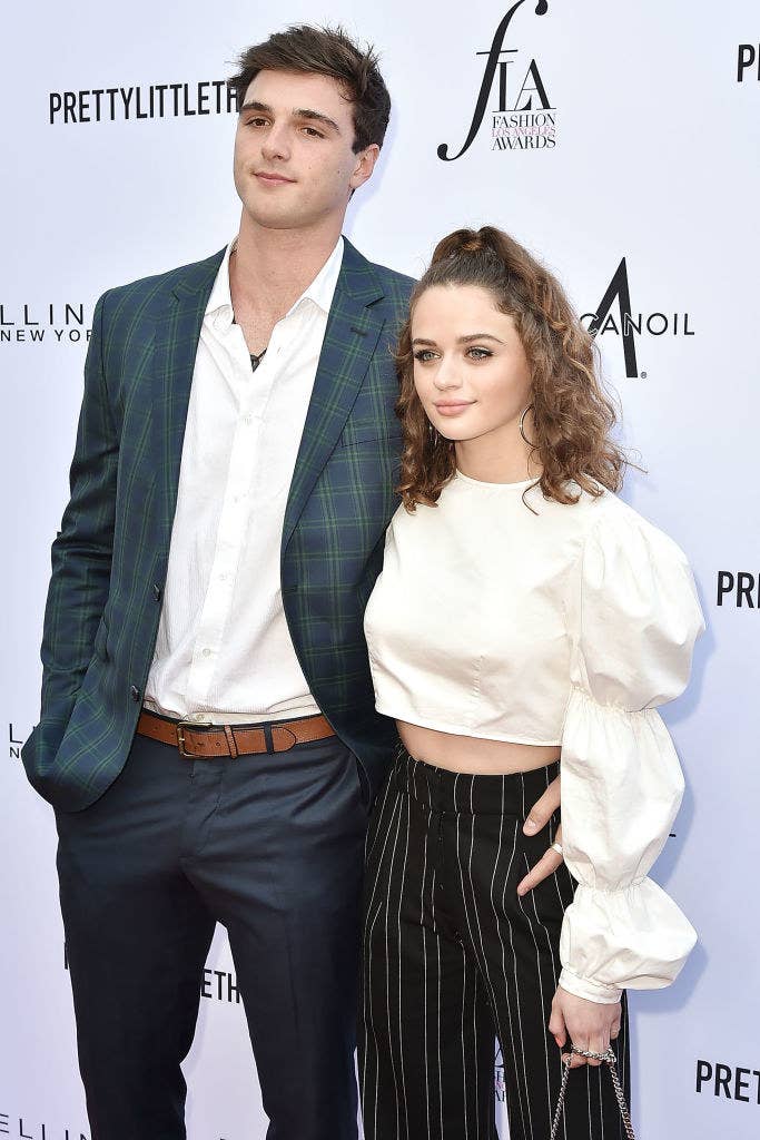 Jacob Elordi holding Joey King&#x27;s waist on a red carpet 