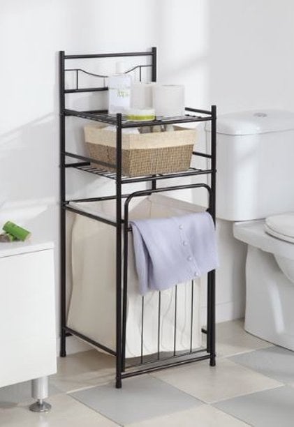 The black metal storage tower with bottom hamper and two top shelves