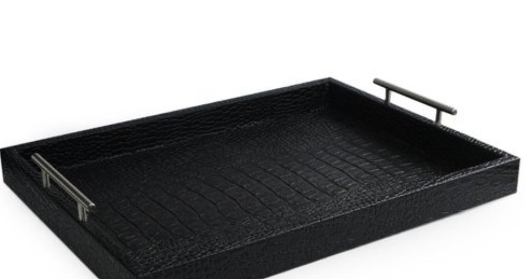 The black leather serving tray with silver handles