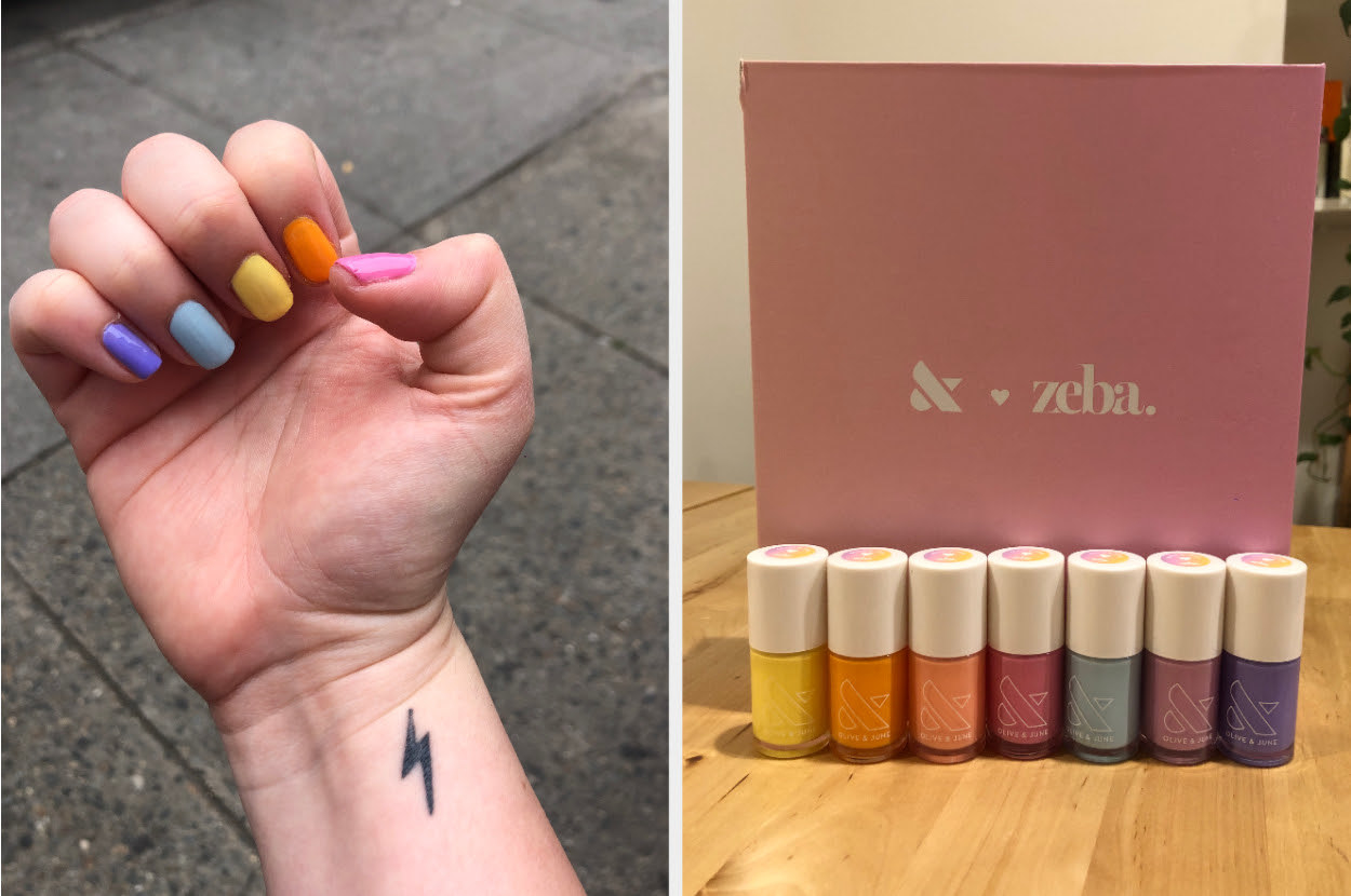 BuzzFeed editor showing her multicolor nails and the box of nail polishes 