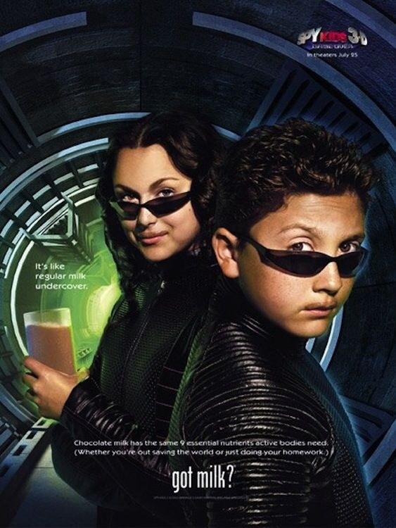 The &quot;Spy Kids&quot; kids looking mysterious with the caption, &quot;It&#x27;s like regular milk, undercover&quot;