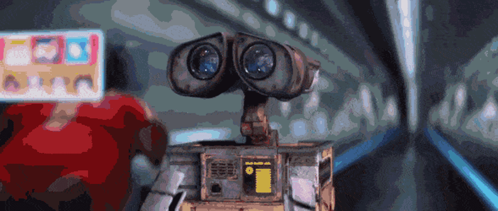 Gif of WALL-E gazing, overwhelmed, at the busy center of the Axiom spacecraft 