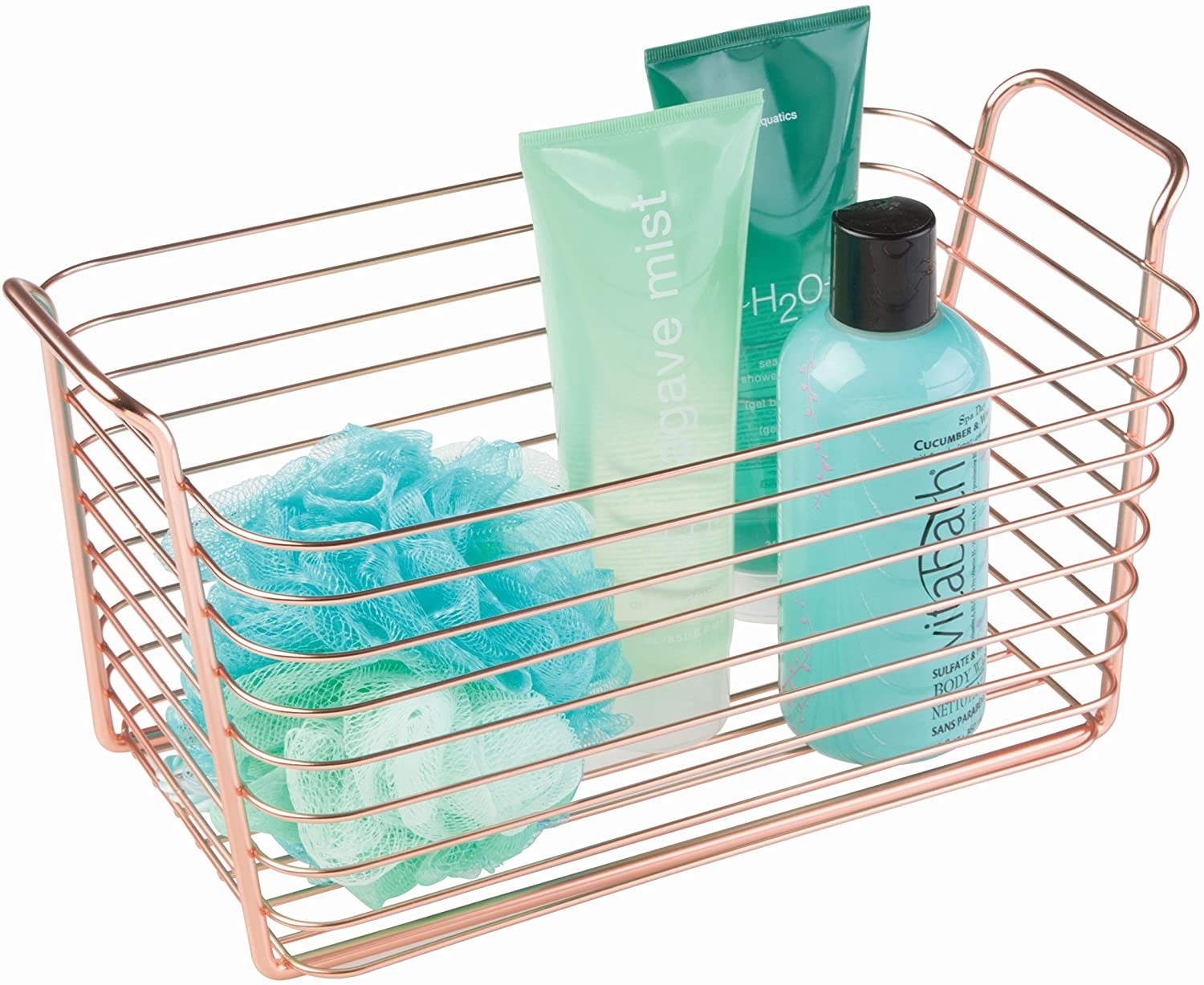 The wire basket with loofahs and toiletries in it.