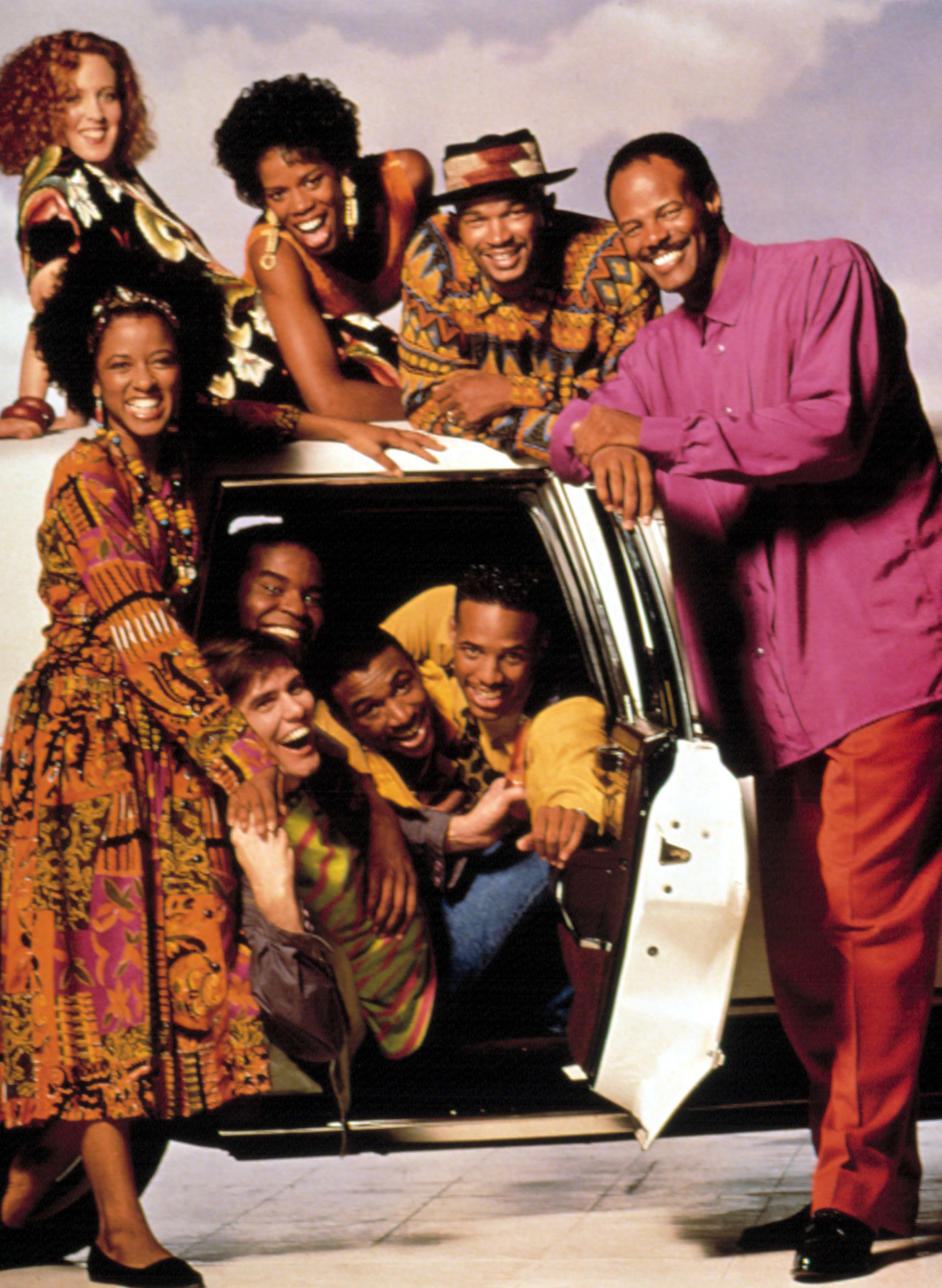 A promotional photo of the cast of In Living Color posing on a white limo.