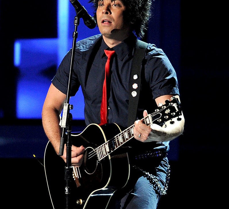 Jimmy Fallon performing during the Emmys while dressed up like Billie Joe Armstrong from Green Day.