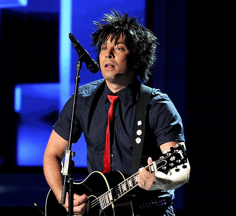 Jimmy Fallon performing during the Emmys while dressed up like Billie Joe Armstrong from Green Day.