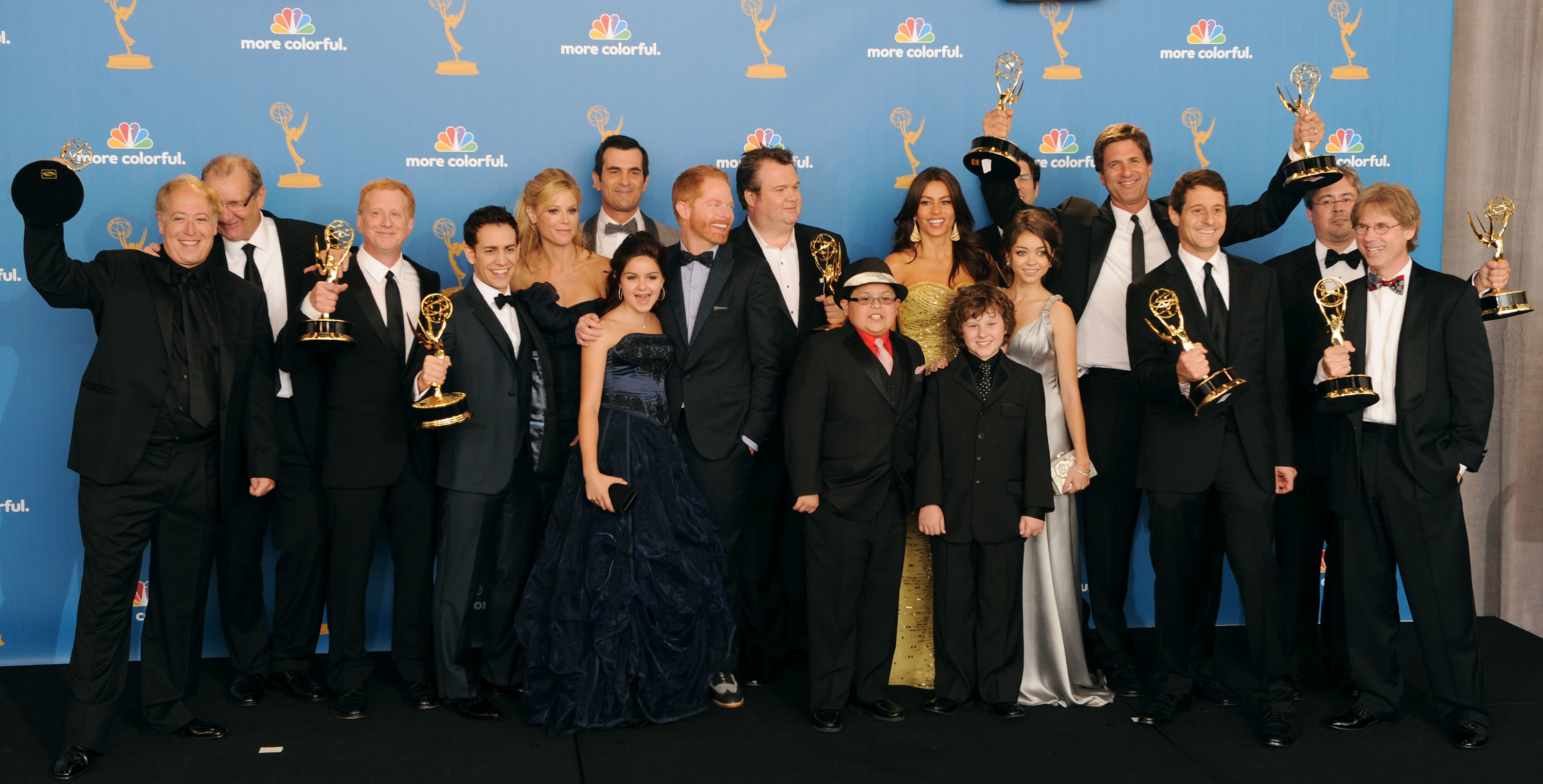 Cast and crew of &quot;Modern Family&quot; posing backstage after winning the Outstanding Comedy Series Emmy.
