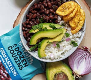 the black beans in a rice, plantains, and avocado bowl lunch