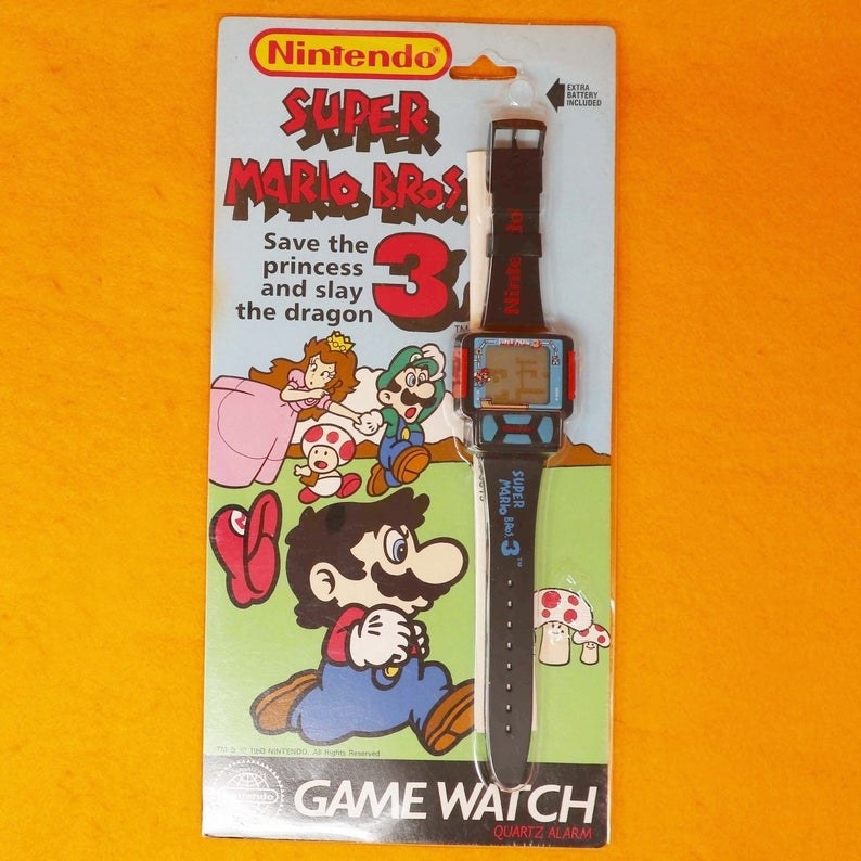 A Super Mario 3 Game Watch still in its original package.