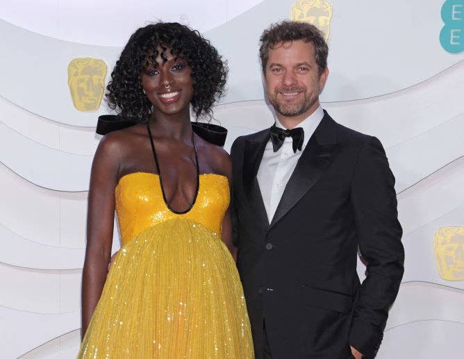 Jodie Turner-Smith and Joshua Jackson posing together at a Hollywood event