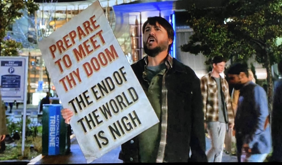 Will Wheaton holding a sing reading &quot;Prepare to meet thy doom the end of the world is nigh&quot;