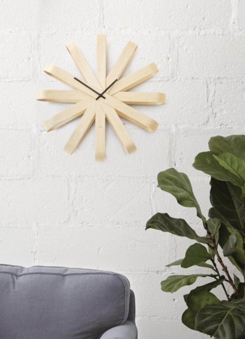 The star-like wooden wall clock