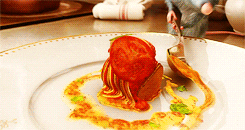 a GIF of a rat carefully plating a meal. This is basically a spoiler alert: The rats become fine chefs in this film.