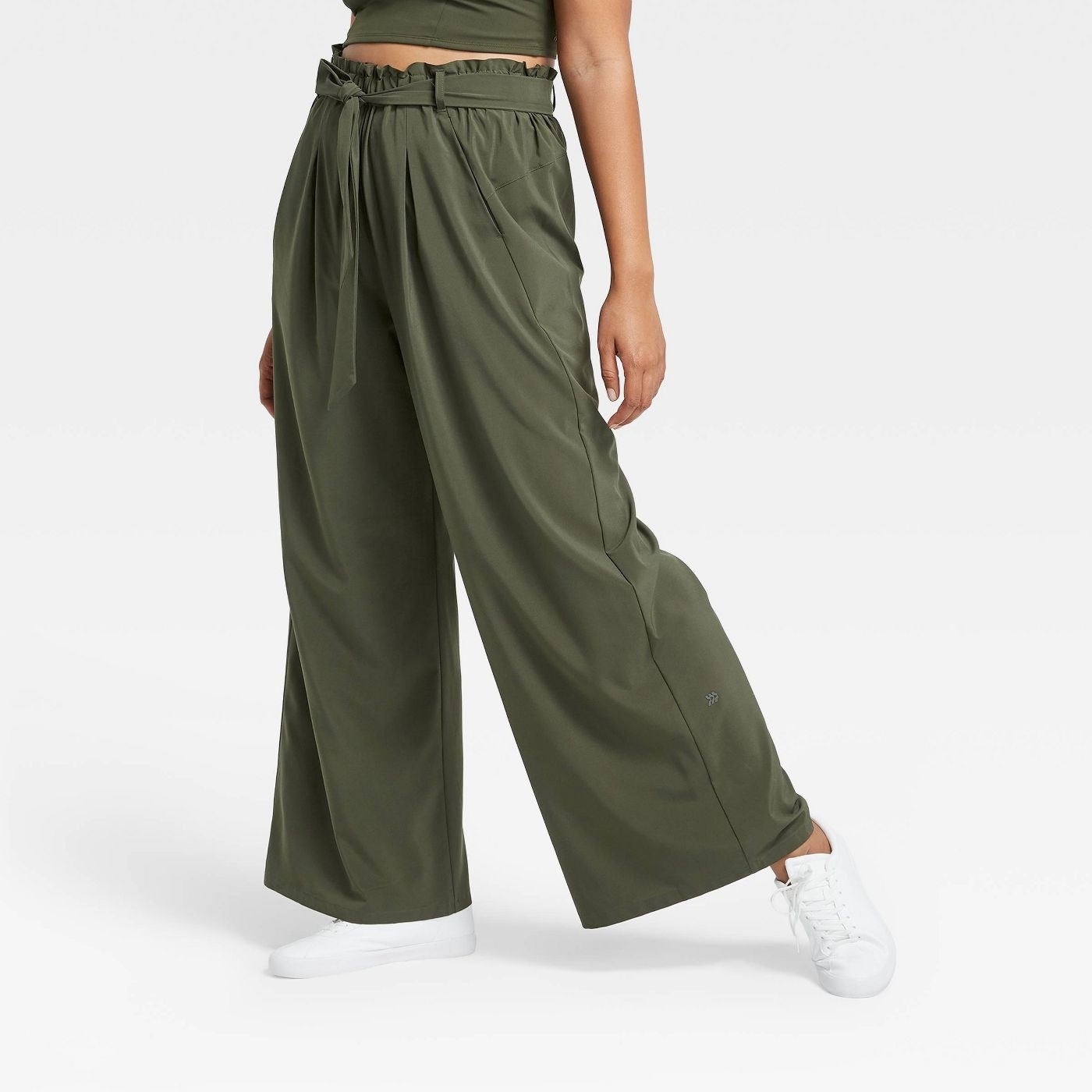 model wearing olive green wide leg pants