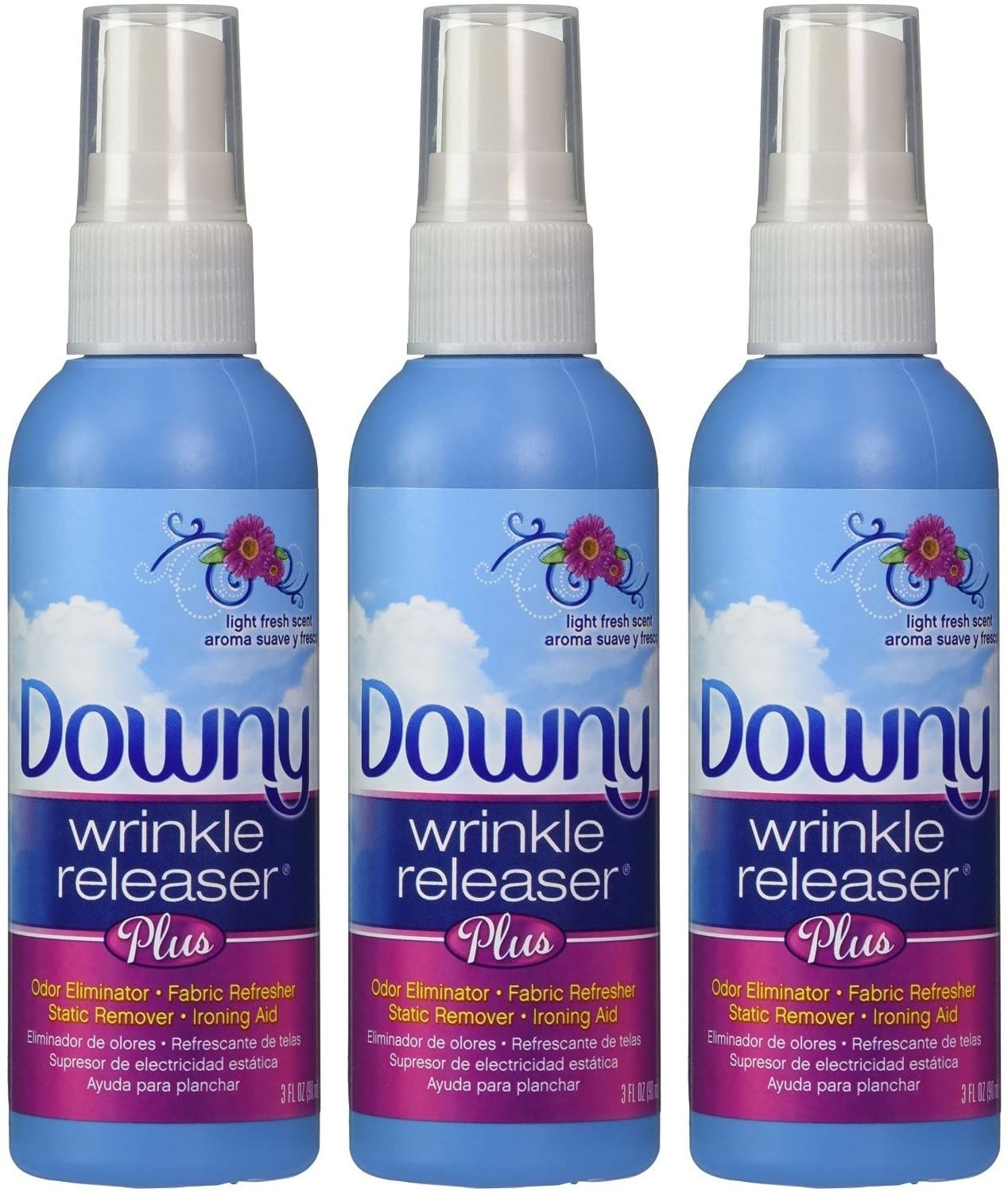 Three small bottles of wrinkle release spray