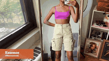 A gif from the As/Is video of Essence trying on the cargo shorts. 