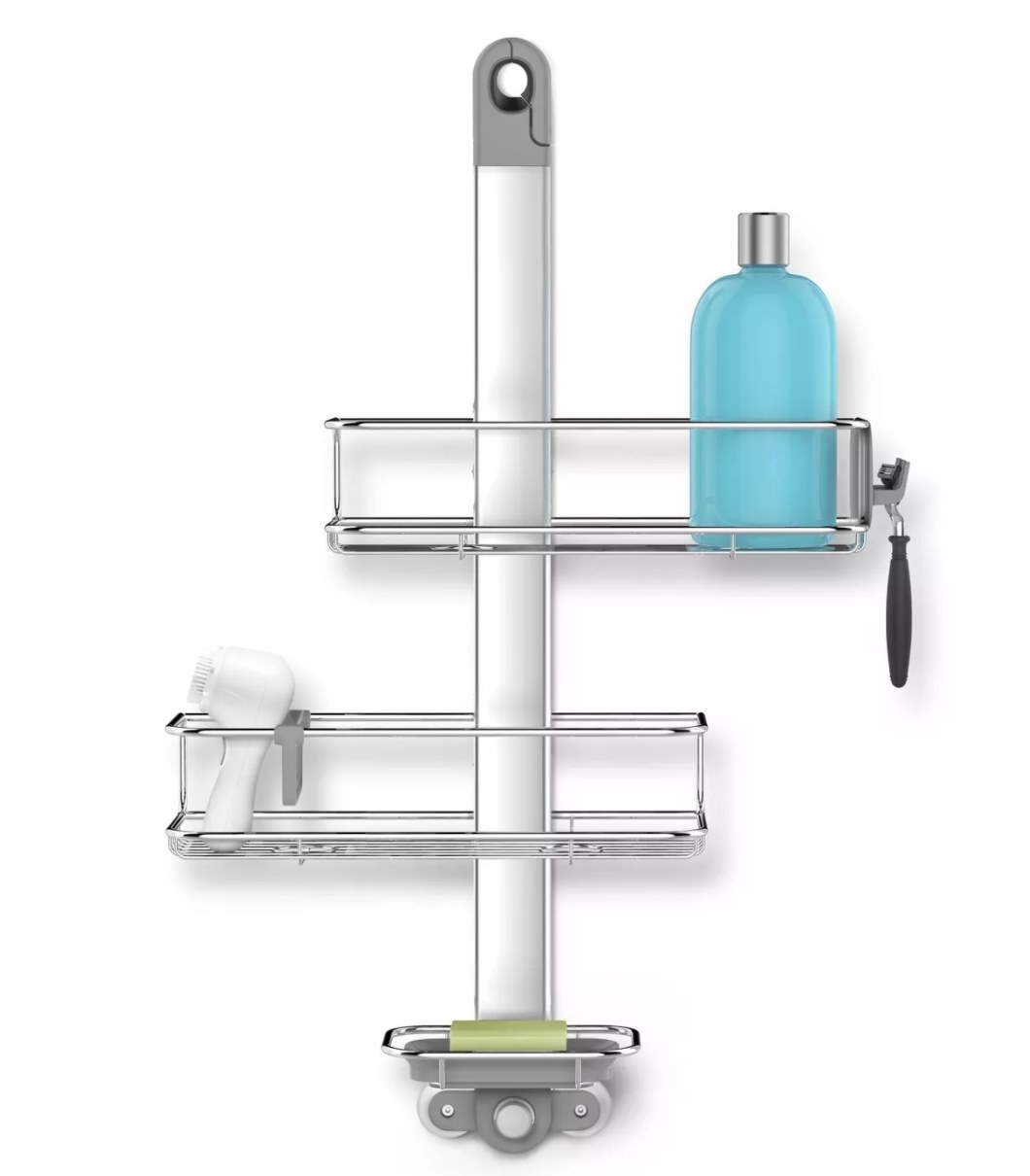 Silver shower caddy with products stored on each of the three shelves