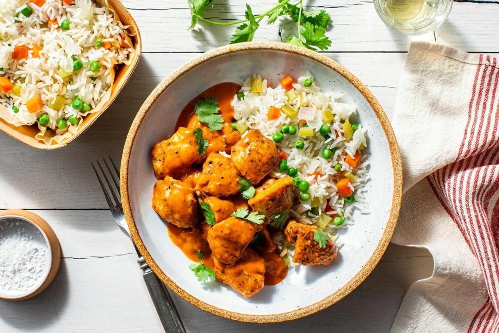 bowl of butter rice with chicken