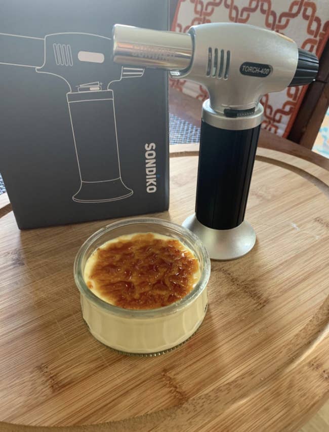 a reviewer's photo of the blow torch and a creme brule