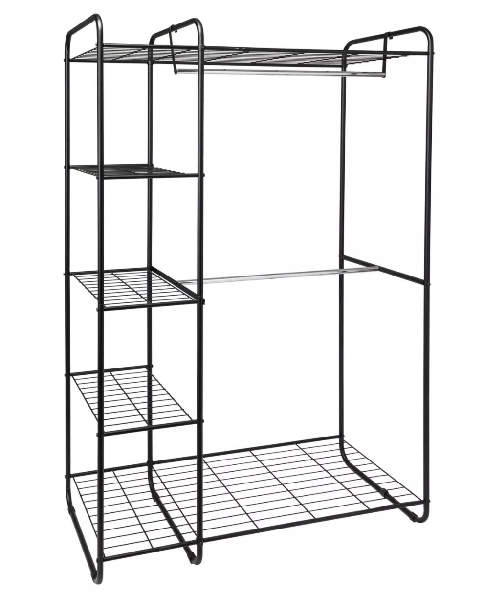 A black freestanding metal garment rack 