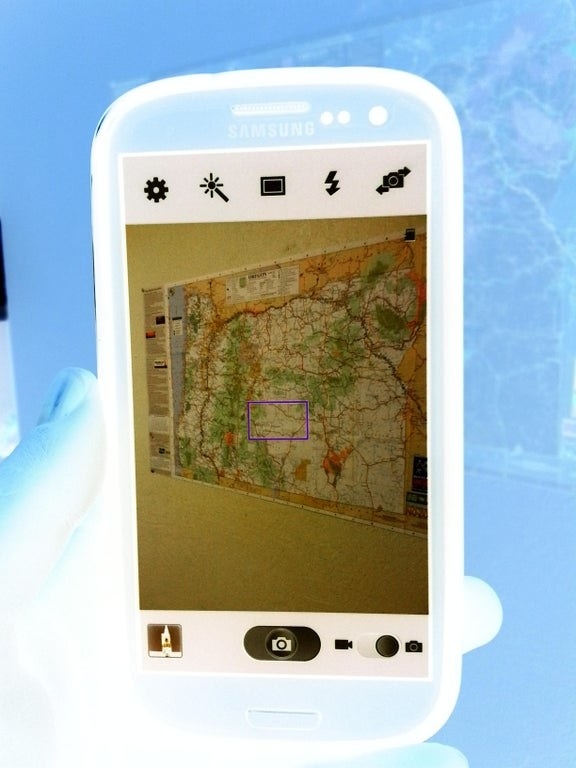 A negative photo of a negative photo of a map on a cell phone makes the map show up perfectly clear