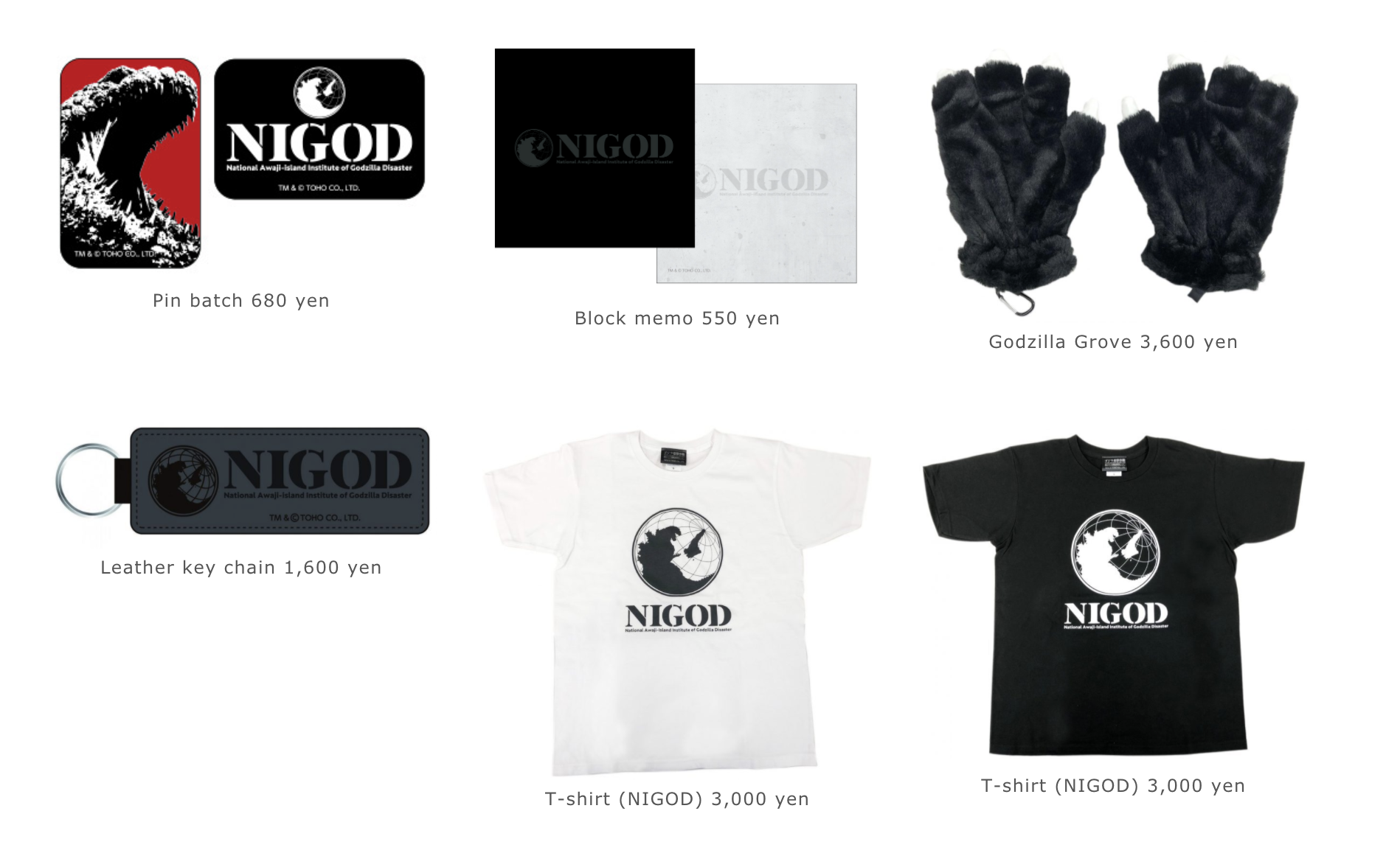 A display of Godzilla-themed souvenirs, including pins, gloves, shirts, and a key chain