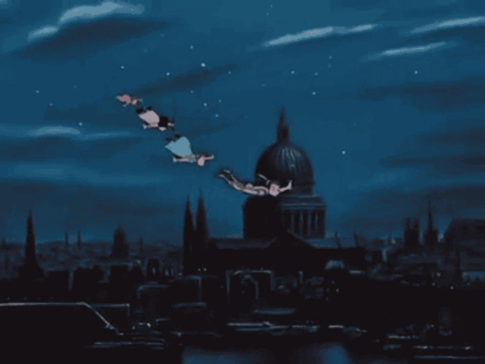 Gif of Peter Pan leading Wendy and her siblings across the sky, flying 