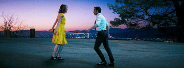 Sebastian and Mia dancing outside