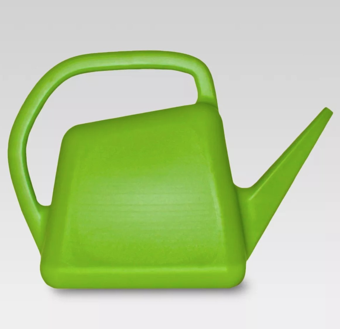A bright green plastic watering can