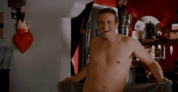 GIF of a man doing a naked dance