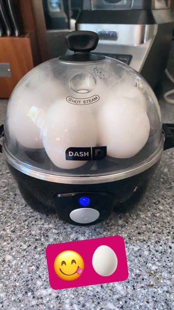 BuzzFeed Editor Samantha Wieder's black rapid egg cooker cooking six hard boiled eggs at a time