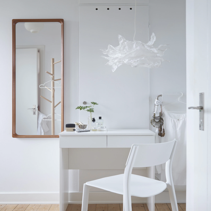 The small white vanity in a room