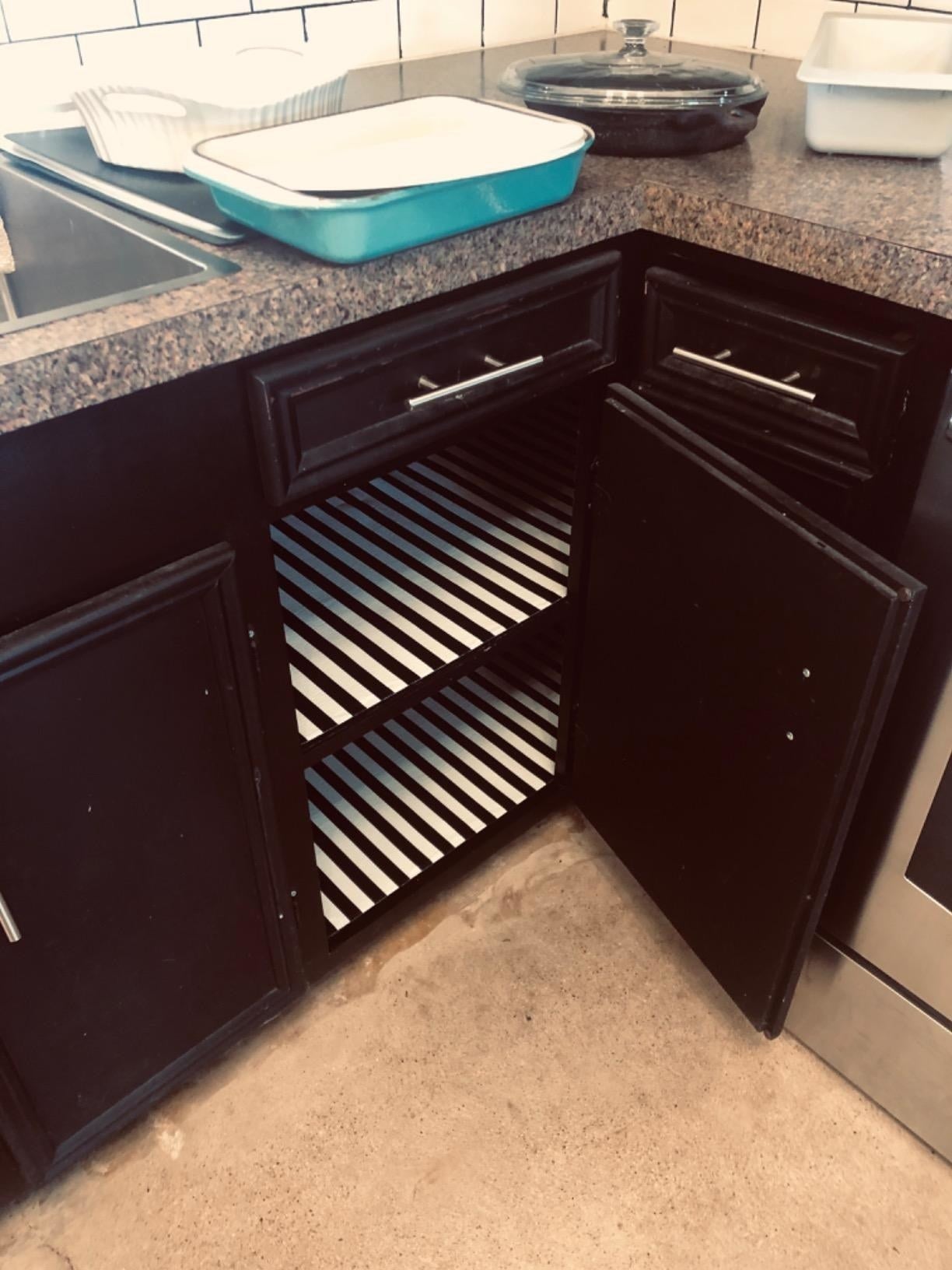 reviewer's cabinets lined with black and white striped liner