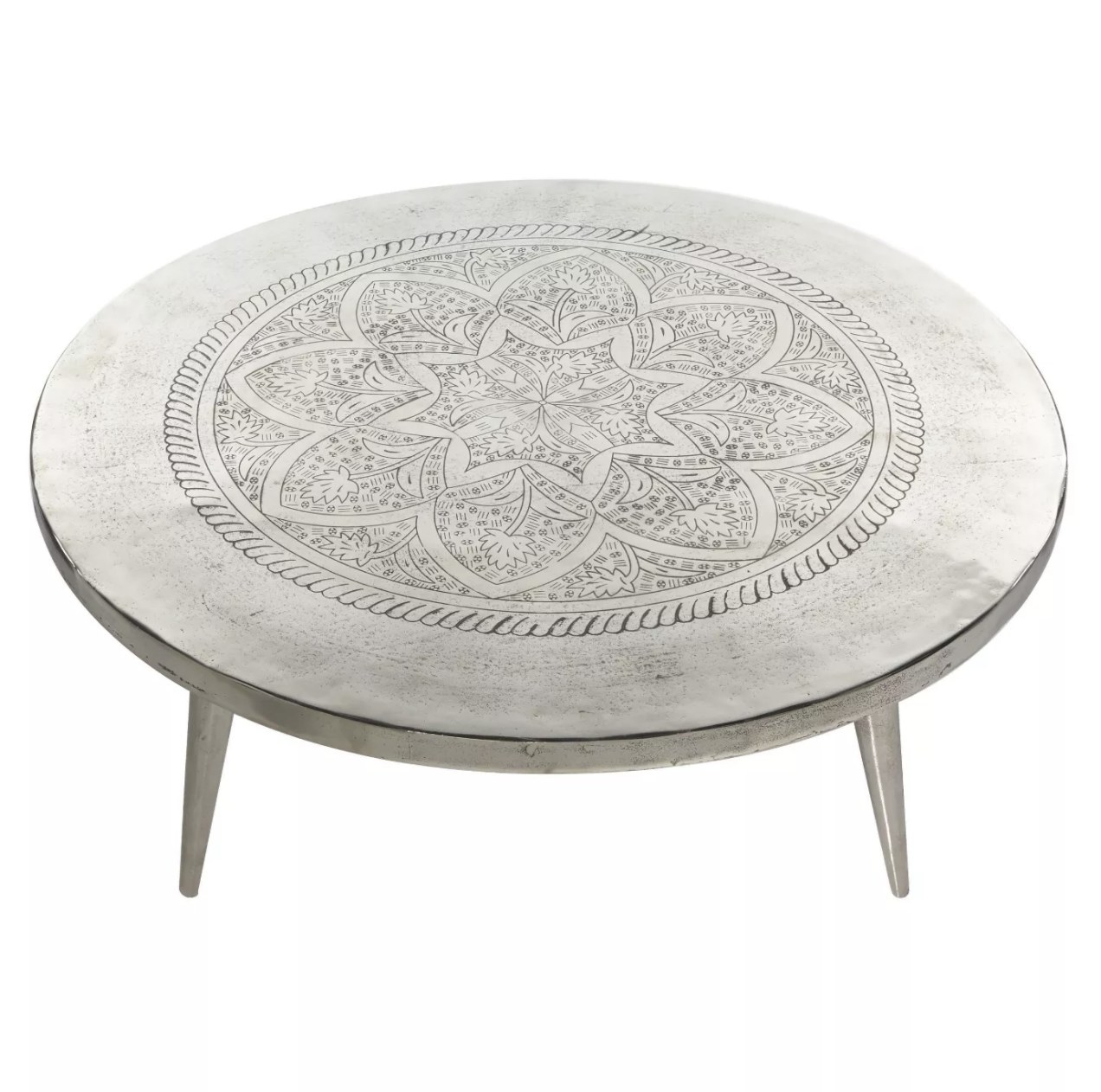 A round, aluminum coffee table with a mandala design