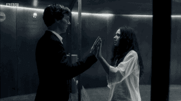 Sherlock and his sister clasping hands