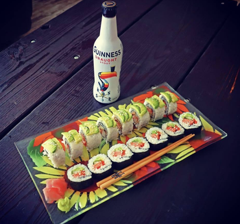 Reviewer image of completed sushi rolls on a plate 