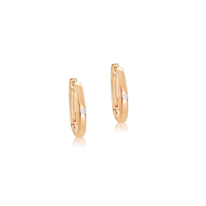 The gold hoops with a single diamond in each