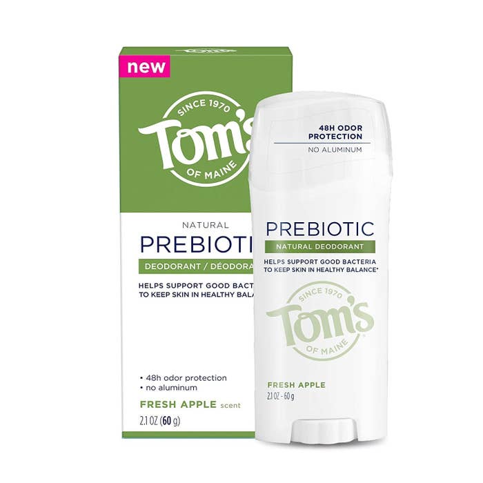 Product photo showing packing and stick of Tom&#x27;s Prebiotic Natural Deodorant in fresh apple
