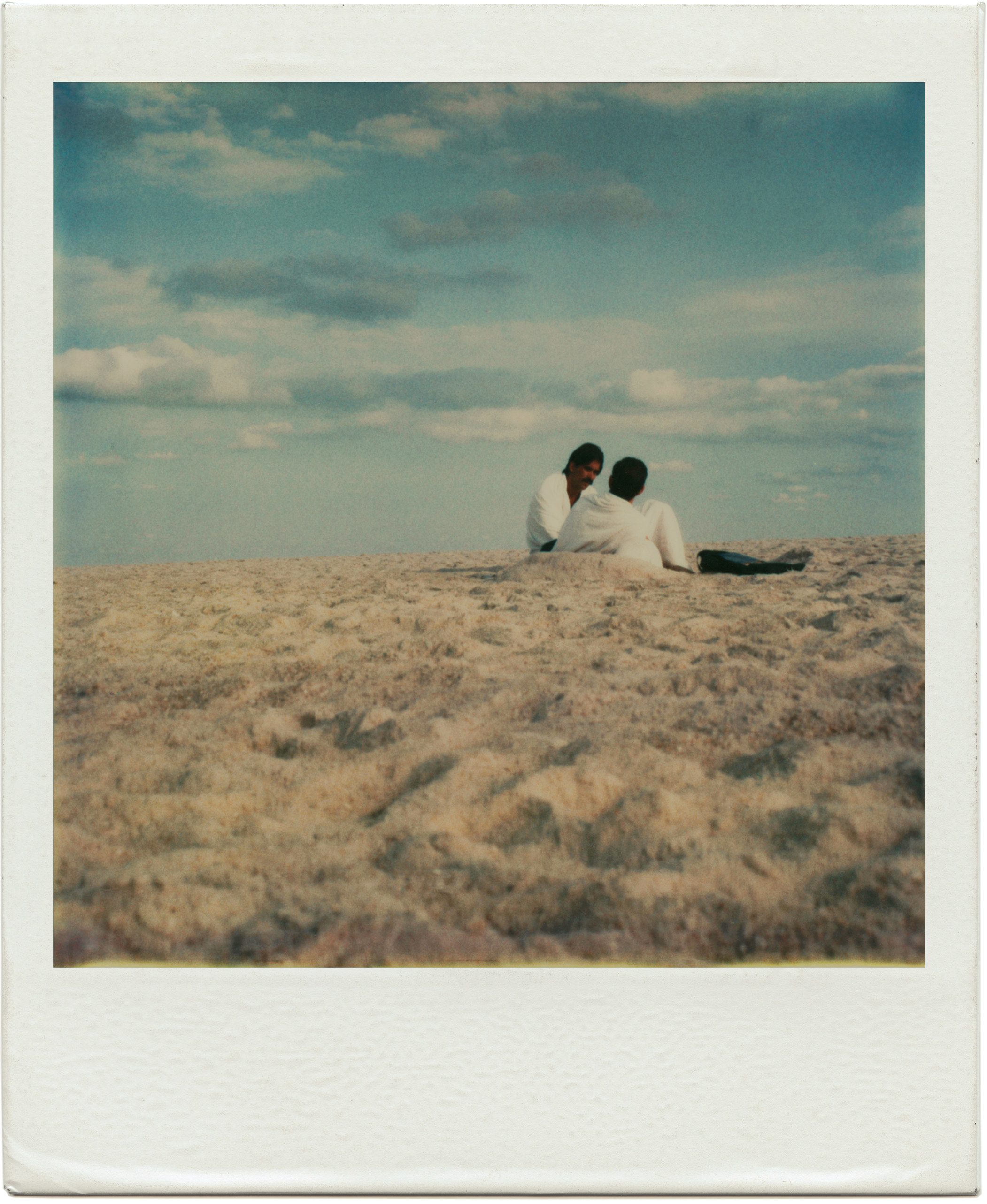 A polaroid provided by the artist Tom Bianchi of two men on a Fire Island beach from his collection of work documenting life on the island from 1970 to 1983