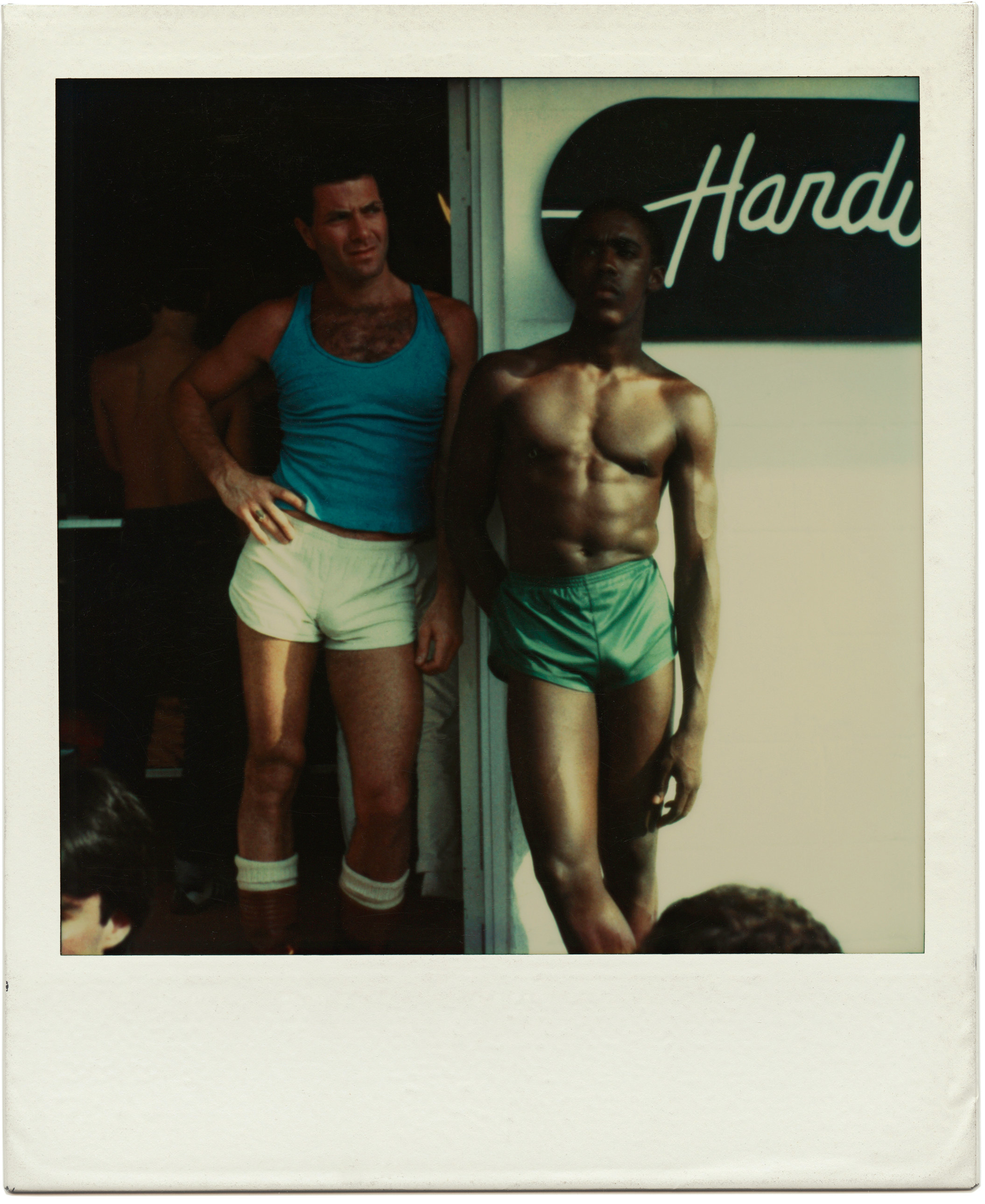 A polaroid provided by the artist Tom Bianchi of two men posing 