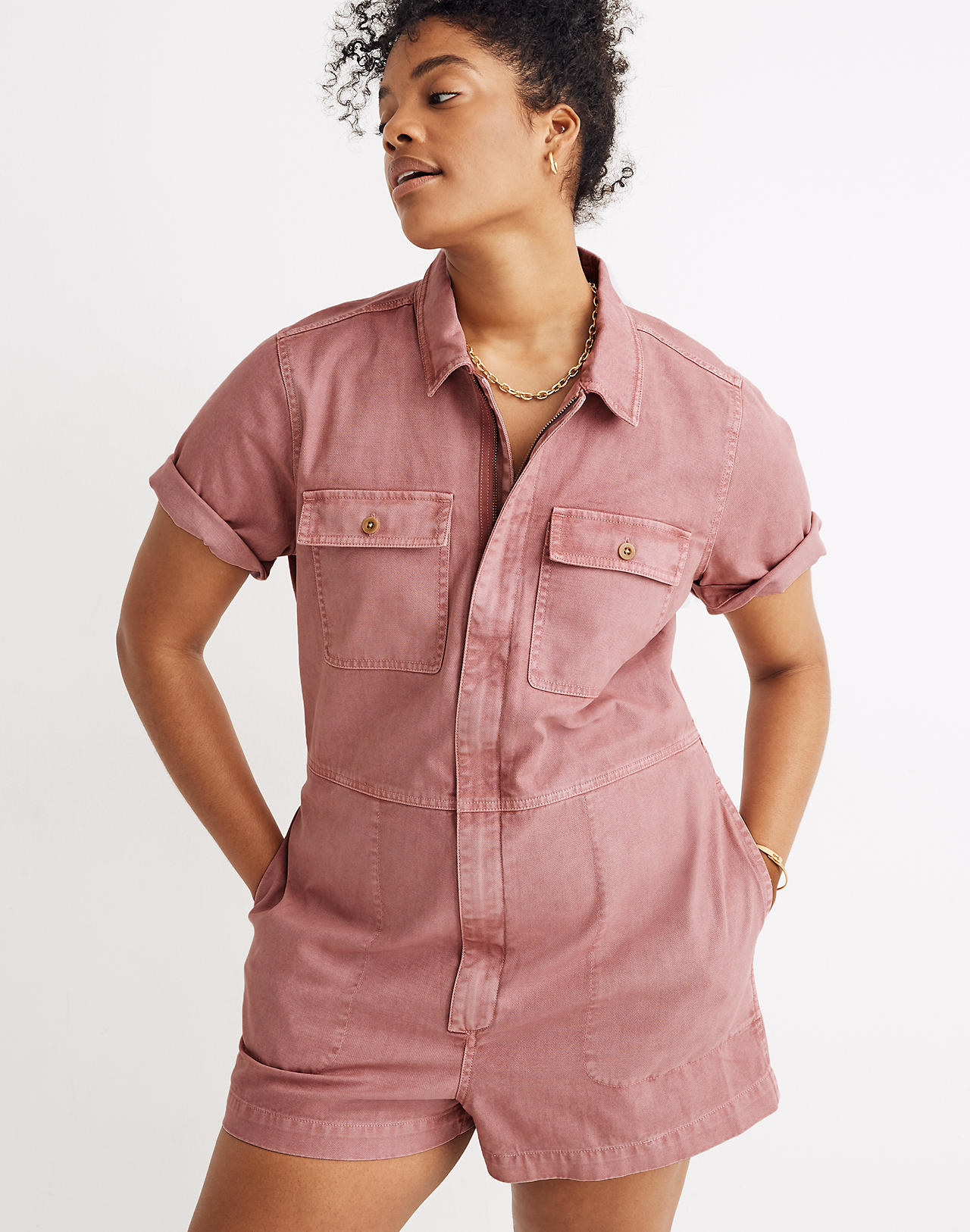 Model wearing the romper in the color weathered berry