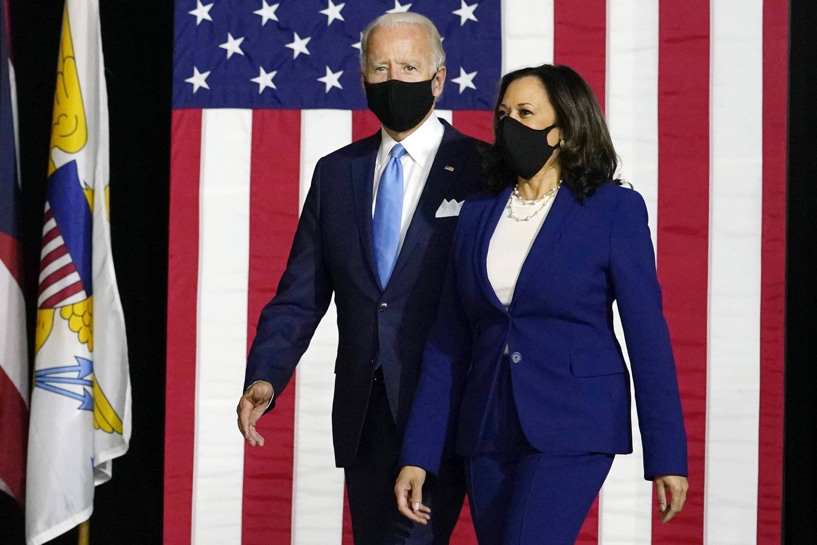 Joe Biden and Kamala Harris in front of the American Flag