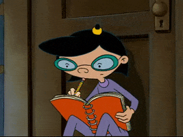 Phoebe from Hey Arnold writing in a notebook 