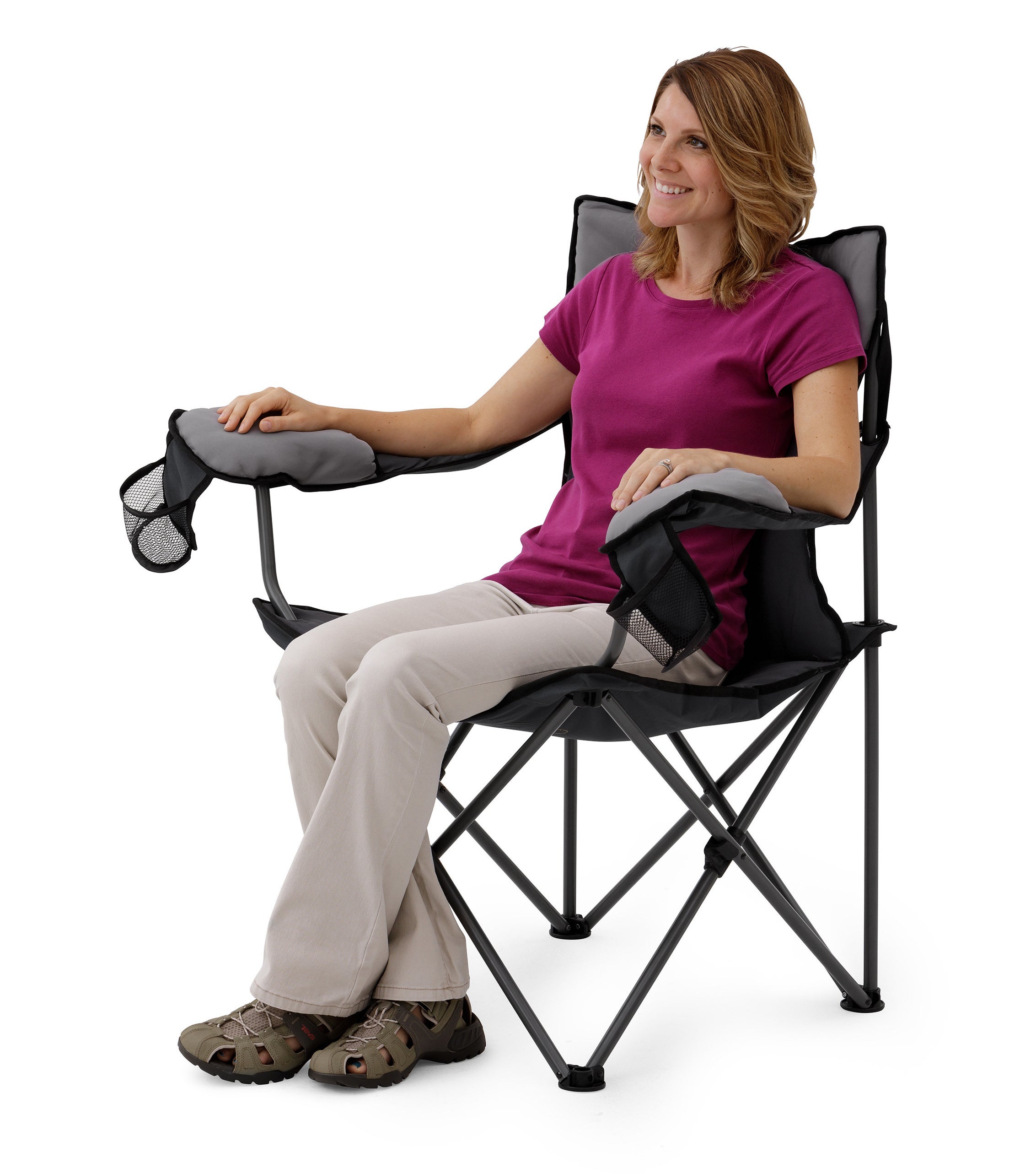 woman sitting in camp chair