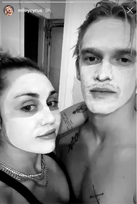 Miley and Cody wearing face masks
