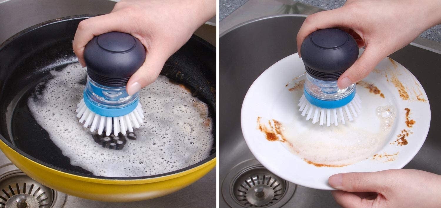 A person using the scrub brush to clean a pan and a dish
