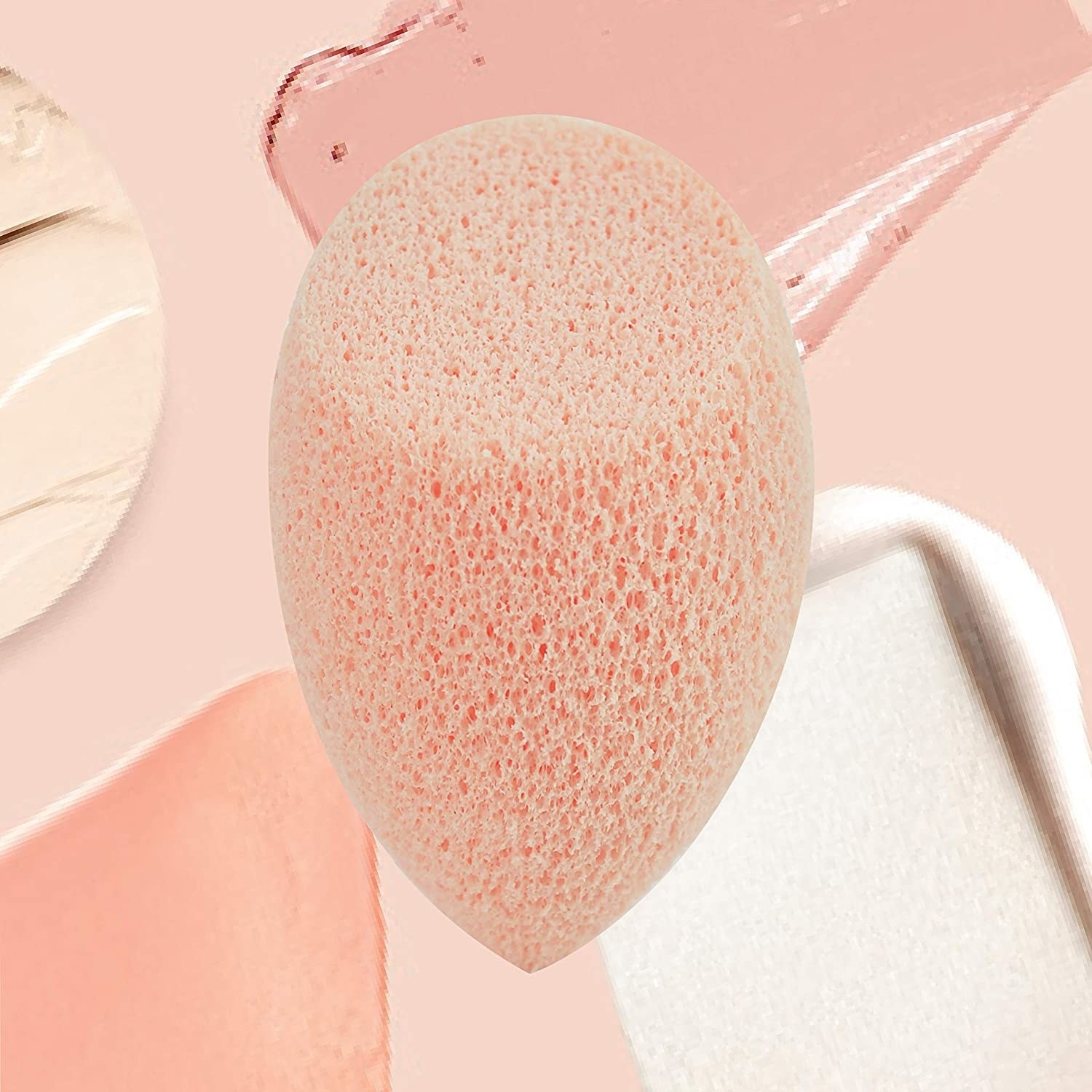 A face-cleansing sponge in front of a background of product swatches